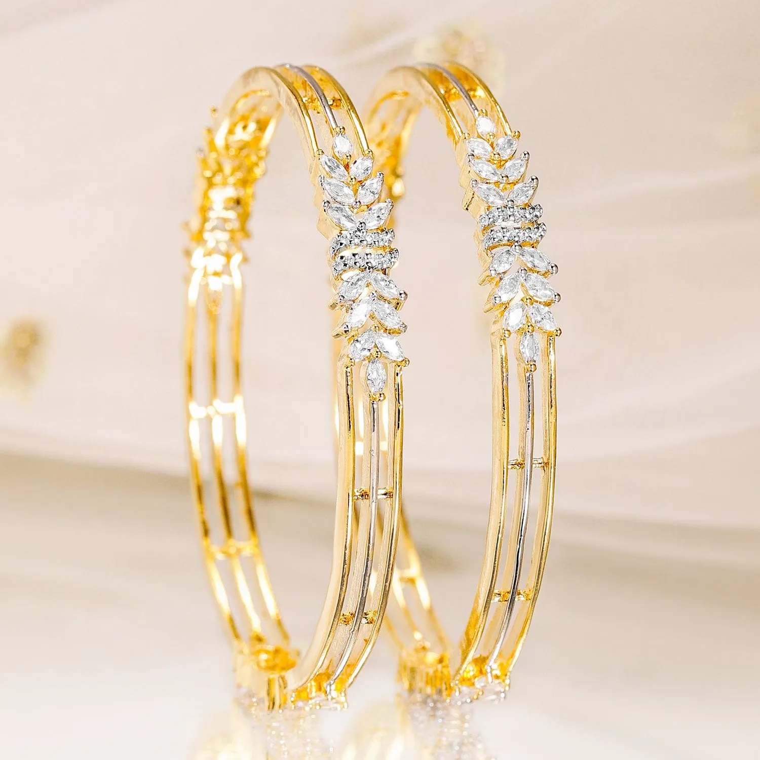 Rubans Set of 2, 22K Gold-Plated Cubic Zirconia Studded Leaf Design Bangles