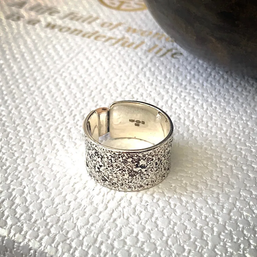 Solid sterling silver and gold ring set with deep blue, rose cut Sapphire. Size R1/2