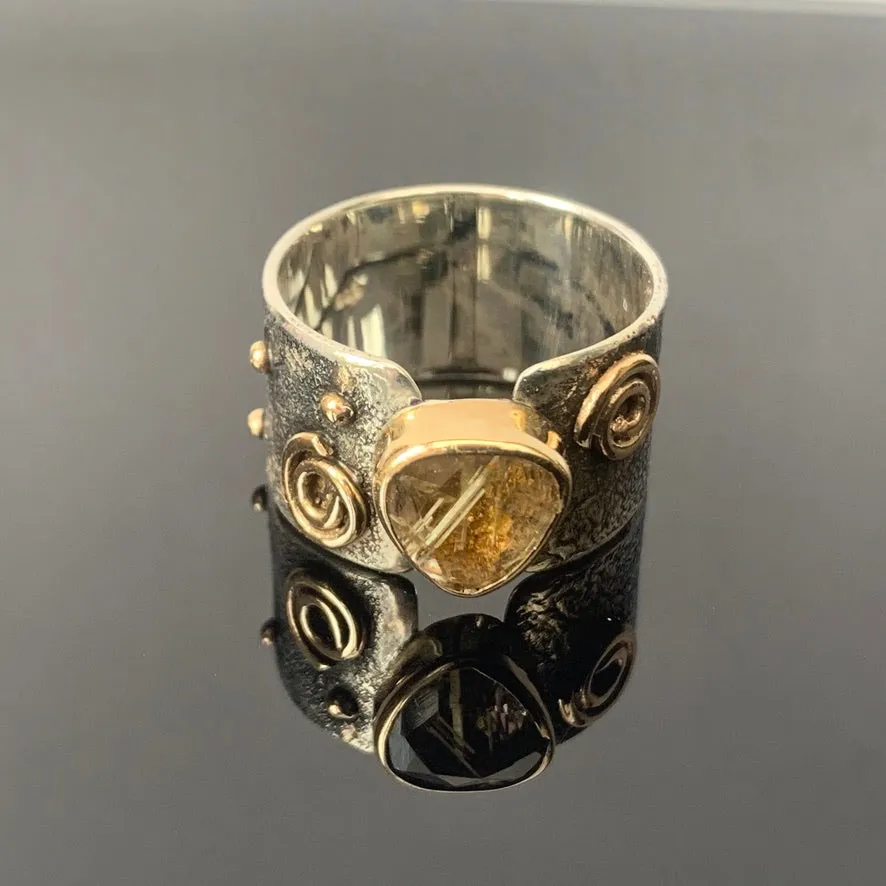 Solid sterling silver and gold ring set with incredible gold rutile quartz. Size T